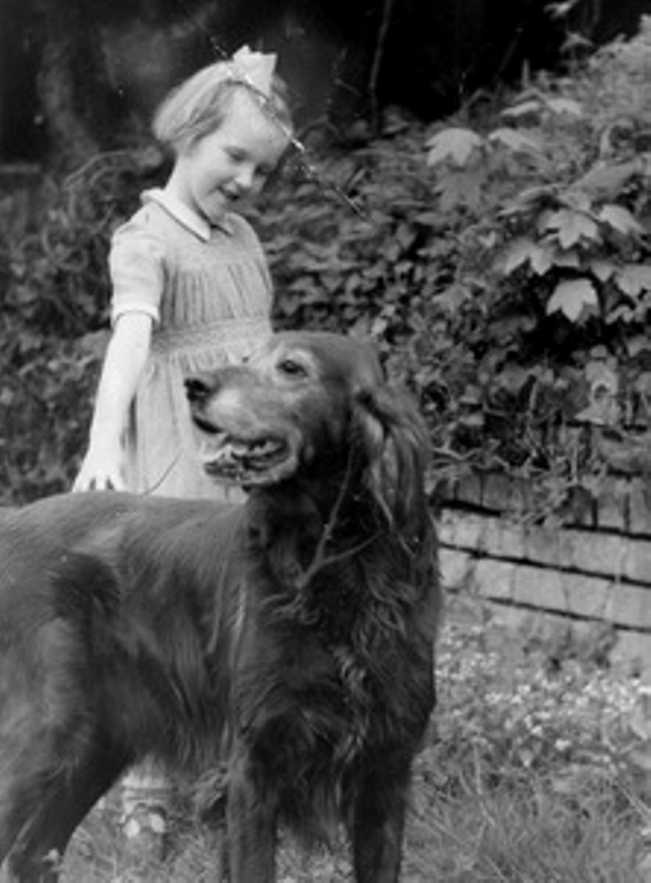 Ingrid with her dog as a child
