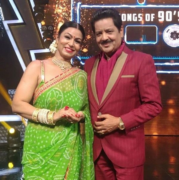 Kiran Dembla (left) with Indian singer Udit Narayan on the sets of Singing Superstar 2
