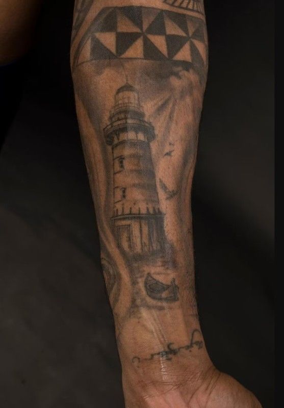 Lighthouse tattoo on left arm of KL Rahul