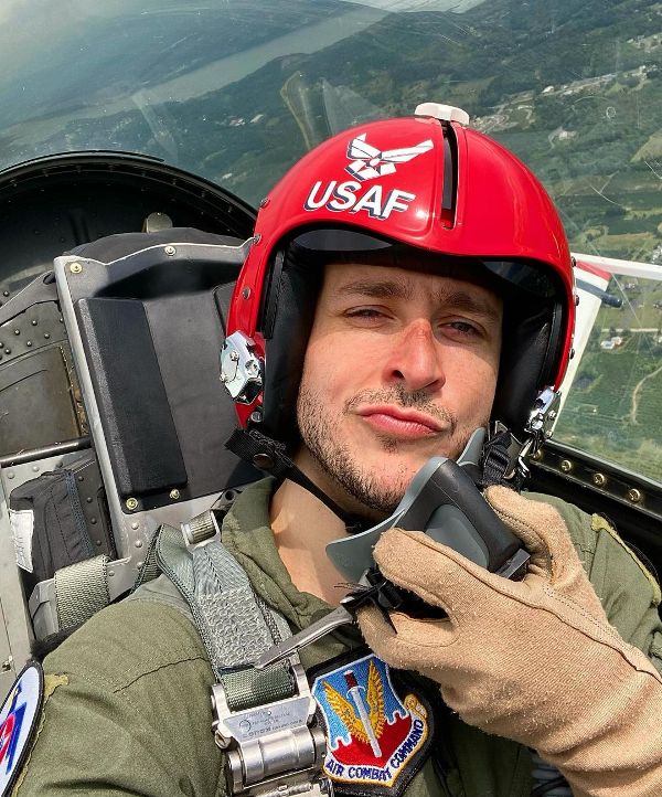 Mike taking a selfie while flying in an F-16 jet
