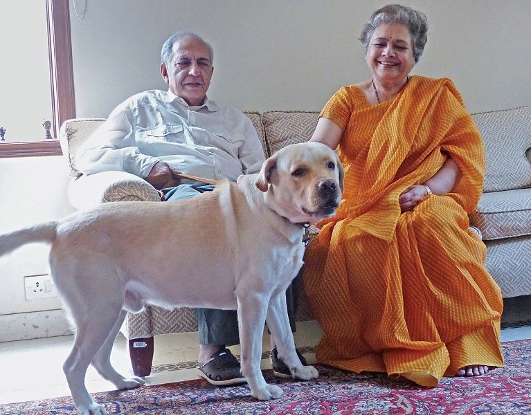 Mrinal Pande with her husband, Arvind Pande, and their dog Mojo