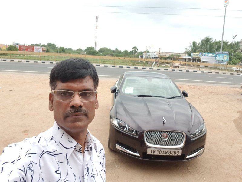 P R Sundar with his Jaguar car