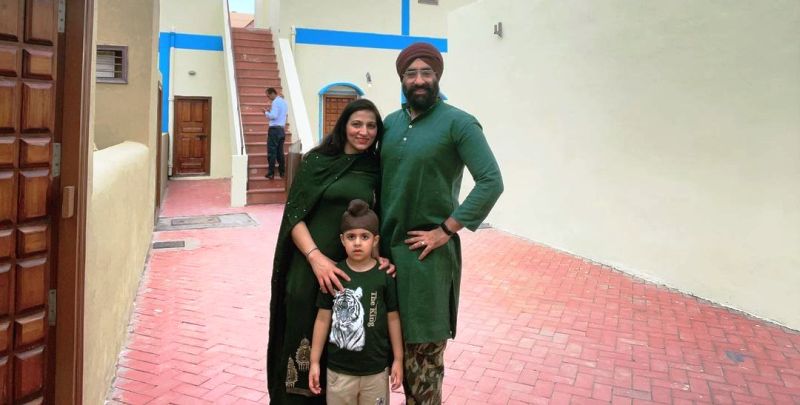 Paramjeet Singh with his son and wife
