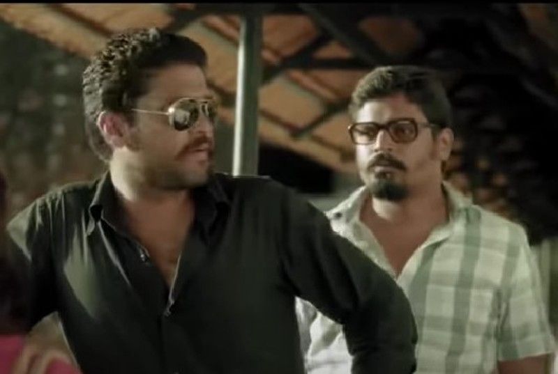 Parmod Shetty (right) in a still from the film 'Ulidavaru Kandante'