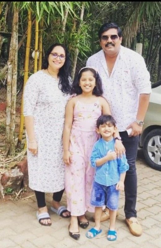 Pramod Shetty with his wife and children