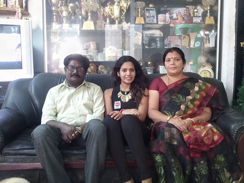 Reeth Rishya's father, Susairaj Tennison, Reeth Rishya, and Reeth Rishya's mother, Jennifer (left to right)
