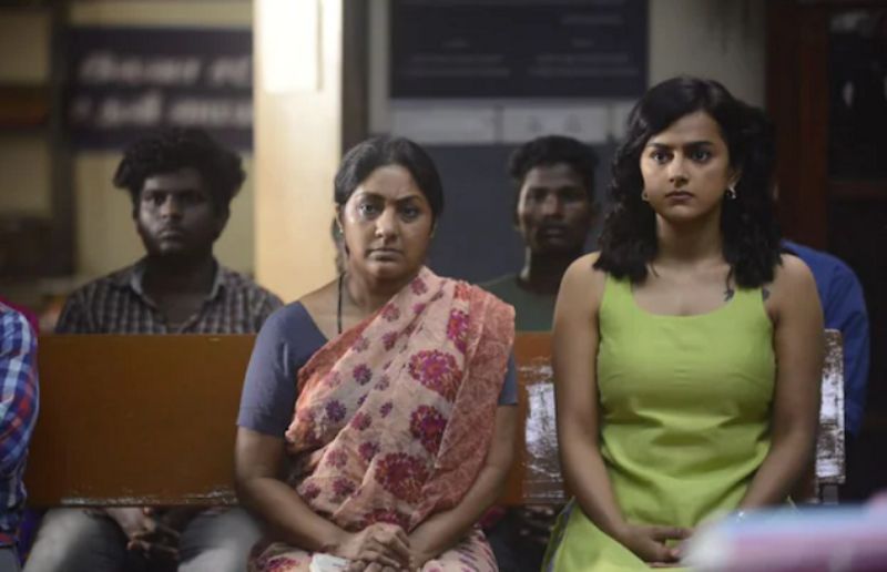 Rohini Molleti (left) as in a still from the Tamil film Witness (2022) as Indrani