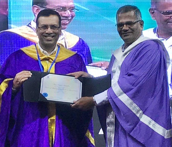 Sanjiv Goenka receiving the Honoris Doctorate in Business Management from the Xavier Institute of Management, Bhubaneshwar