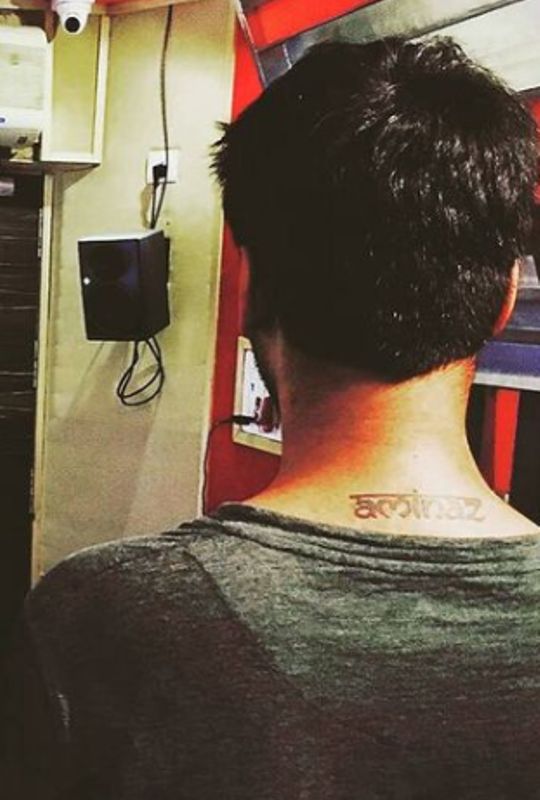 Siddharth Amit Bhavsar's tattoo on the back of his neck, derived from the initials of his parent's names