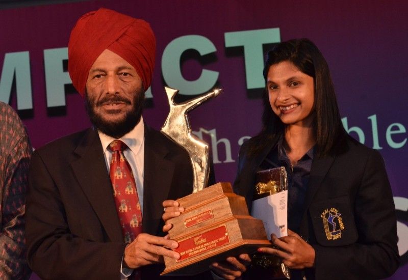 Srabani Nanda (right) awarded Eklavya award 2016 by renowned Indian athlete Milkha Singh