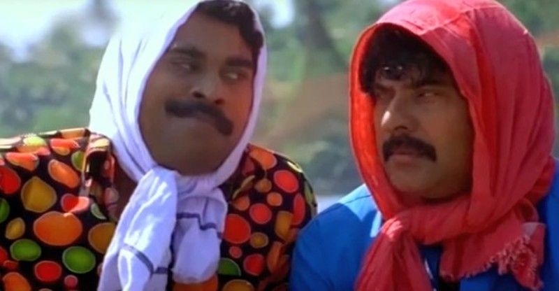 Suraj Venjaramoodu (left) with Mammootty (right) in a still from the film 'Mayavi' (2007)