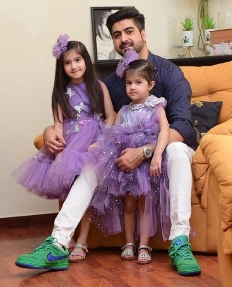 Syed Ali Haider with his daughters