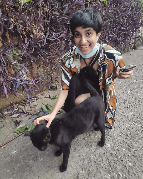 Tanvi Sonigra posing with a cat