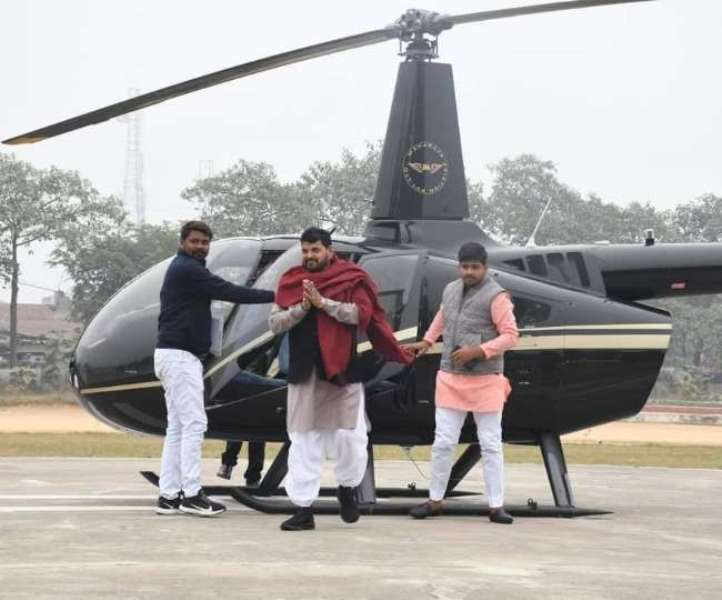 A picture of Brij Bhushan Sharan Singh arriving in Delhi by his own helicopter