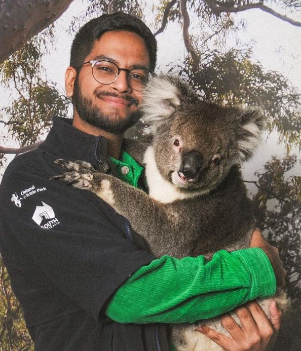 A picture of Shivesh hugging a Koala