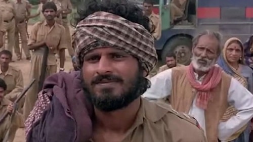 A still of Manoj Bajpayee as dacoit Maan Singh in the Hindi film Bandit Queen (1994)
