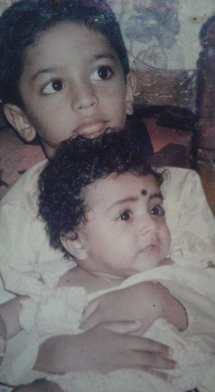 Aarsha Chandini Baiju with her brother