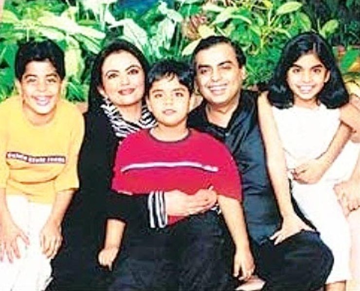Anant Ambani (in red T-shirt) with his parents and siblings in childhood