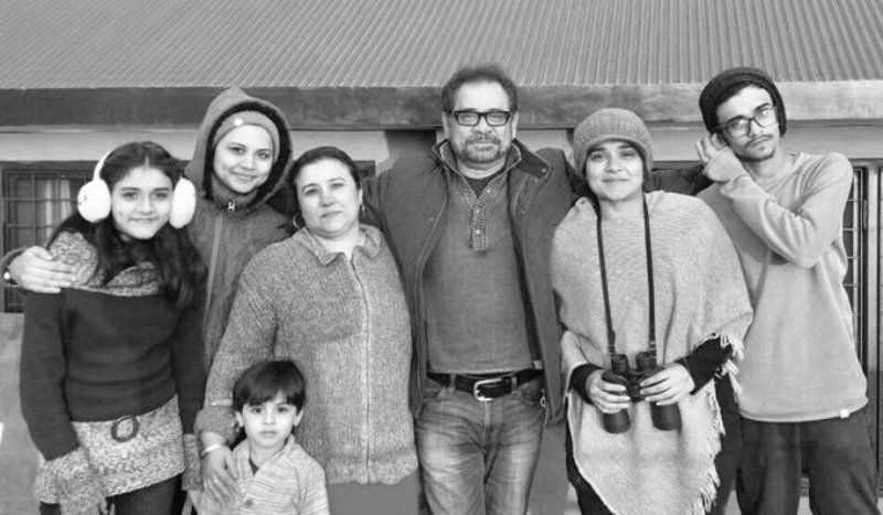 Anees Bazmee (third from right) with daughter, Sarah Bazmee (left), and son, Faizan Bazmee (right)