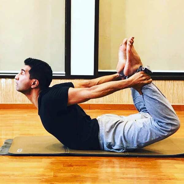 Anil Antony performing yoga