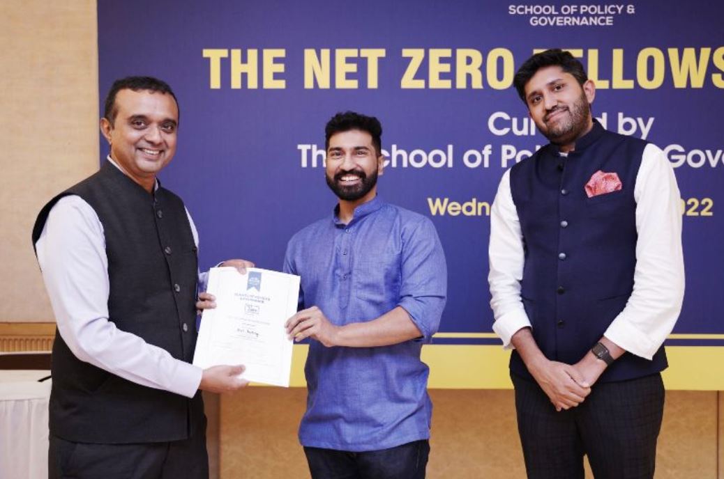 Anil Antony receiving a certificate from the School of Policy for attending Net Zero Fellowship program in 2022