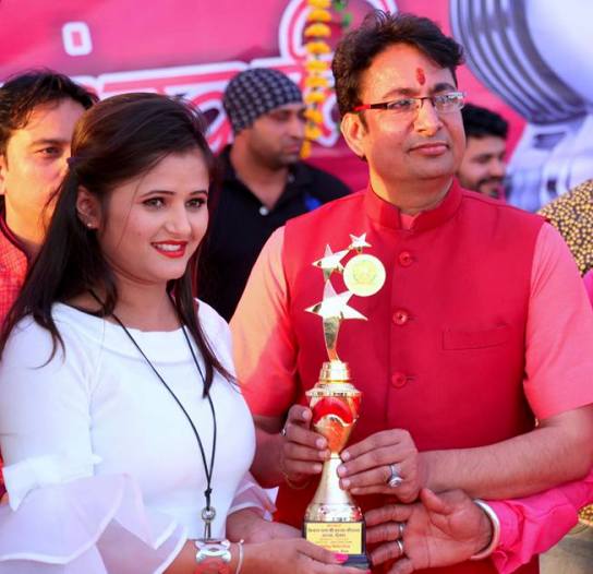 Anjali Raghav posing after receiving her Best Female Model in Haryana Award