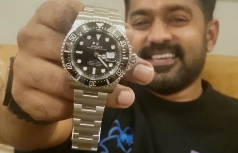 Asif Ali with his Rolex watch