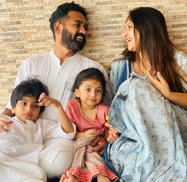 Asif Ali with his wife and kids