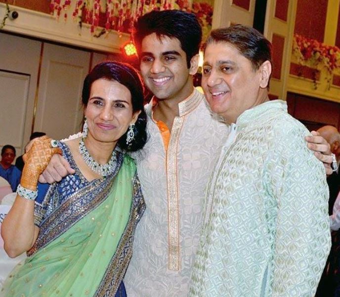 Deepak Kochhar with his wife and his son