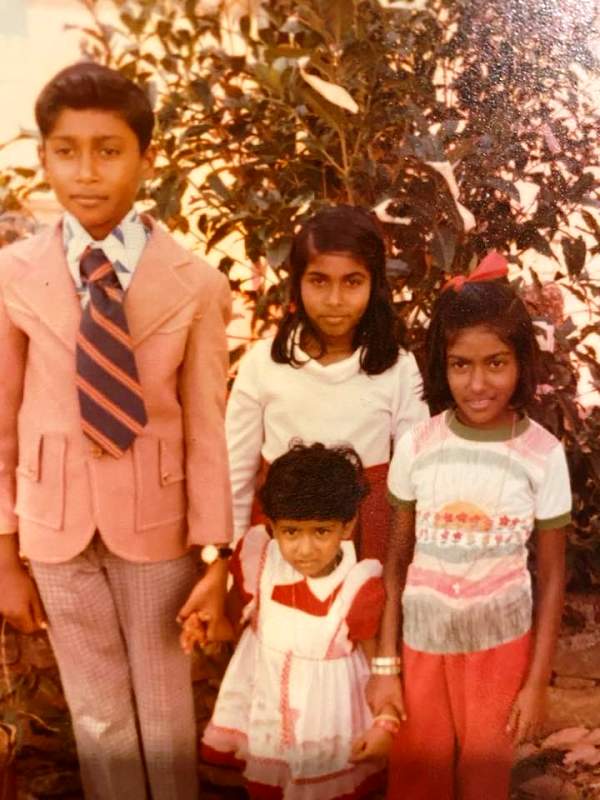 Childhood picture of Juli A Mathew (standing in front)