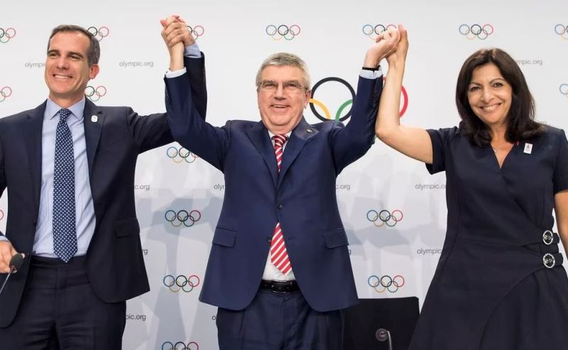 From left - Eric Garcetti, IOC President Thomas Bach, and Mayor of Paris Anne Hidalgo during a press conference after the International Olympic Committee (IOC) Extraordinary Session in Switzerland in 2017