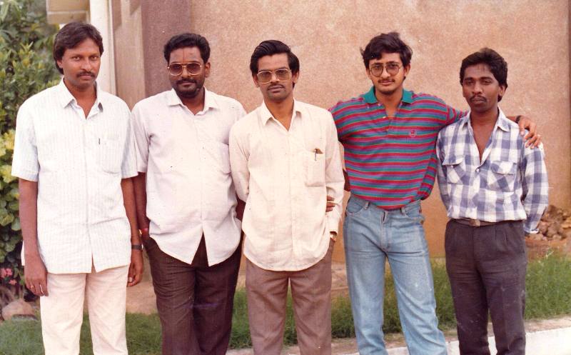 From left to right, Siva Nageswara Rao (director), M. M. Keeravani, Sirivennela Seetharama Sastry (lyricist), Teja (assistant director), and a crew member working on the film Kshana Kshanam (1991)