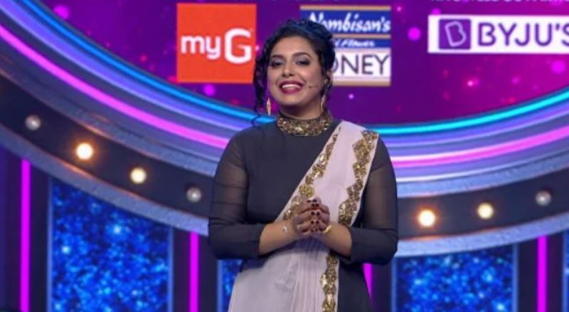 Jewel Mary as an anchor for Asianet TV reality show Star Singer
