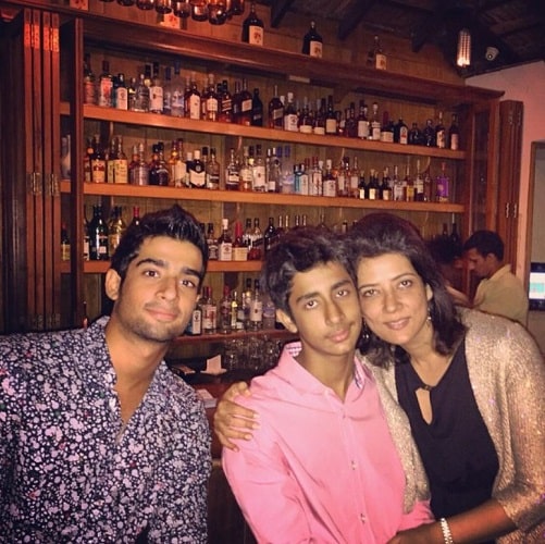 Karan Kothari with his mother and brother