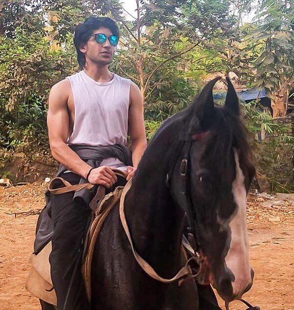 Karan Mehta riding a horse