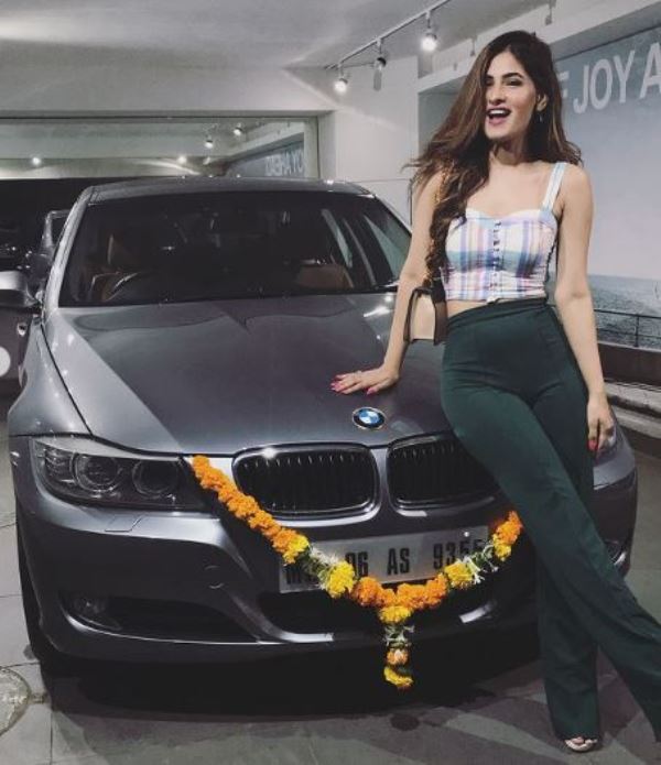 Karishma Sharma with her BMW car