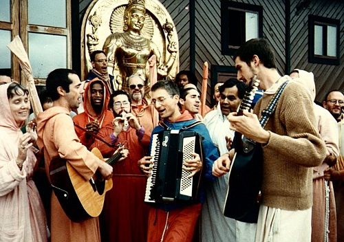 Kirtanananda Swami and other devotees doing kirtan using western musical instruments