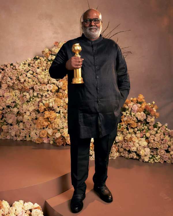 M. M. Keeravani posing with his Golden Globes Award in 2023