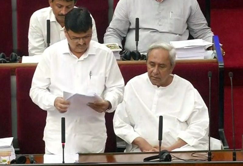 Niranjan Pujari (left) representing Supplementary Budget of the financial year 2012-2022 as the Finance Minister in the Odisha Legislative Assembly
