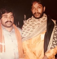 Oil Kumar (right) with a friend