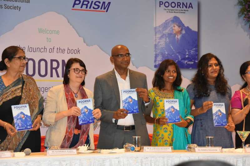 Poorna Malavath (second from right, in yellow) launching the book based on her life