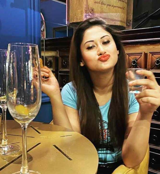 Priyanka Biswas enjoying a drink