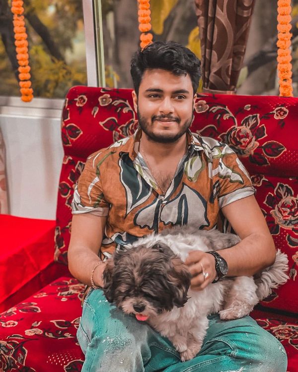 Raj Barman with his dog