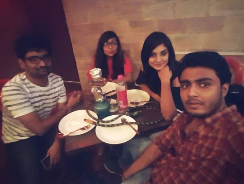 Raj Barman with his friends enjoying hookah