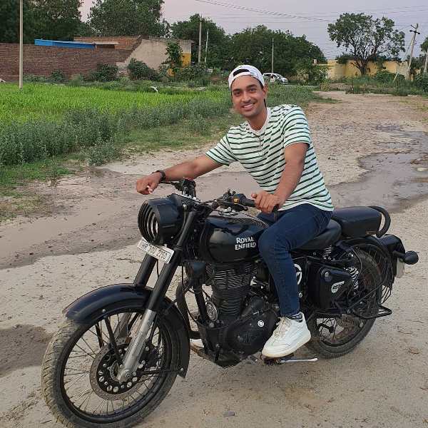 Rohit Gujjar riding a motorcycle