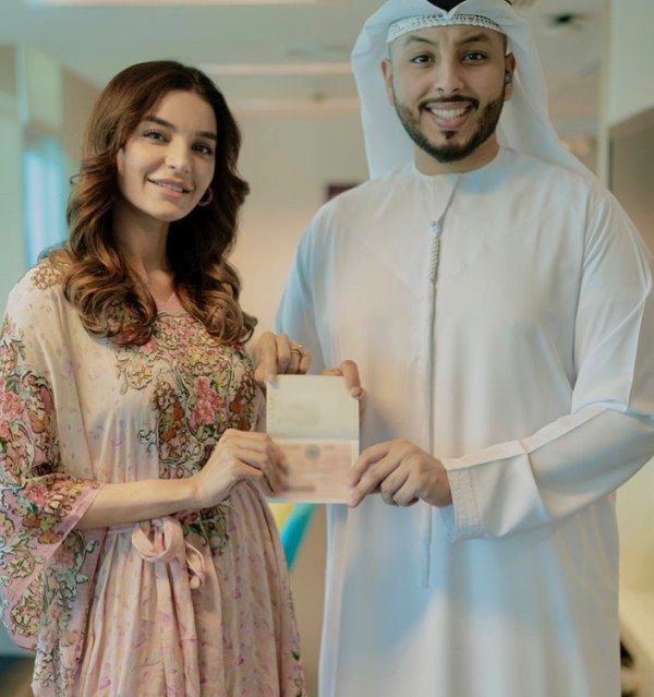 Sadia Khan receiving Golden Visa from the Government of UAE