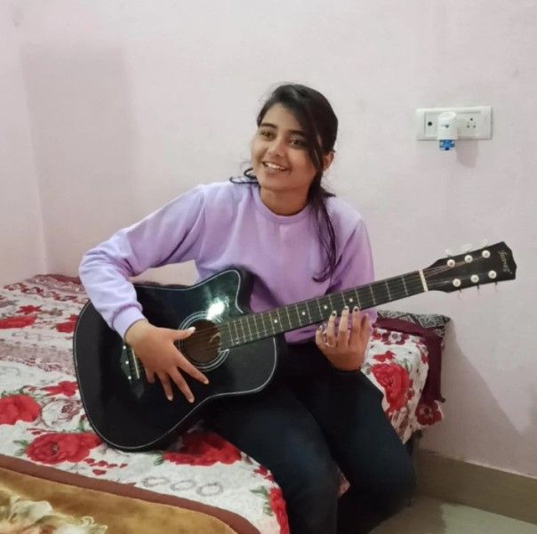 Saniya Mirza playing guitar