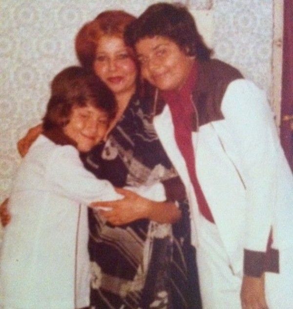 Shehzad Khan during his childhood with his brother and mother