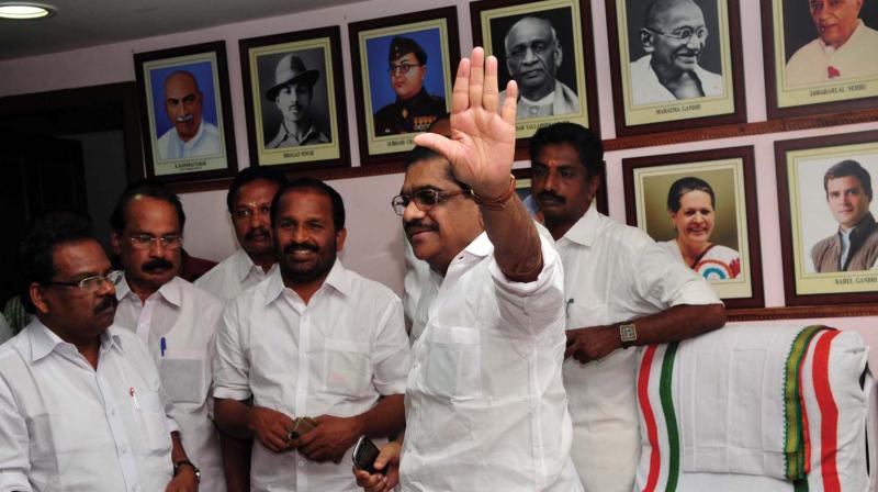 Sudheeran with party workers at Indira Bhavan, Thiruvananthapuram