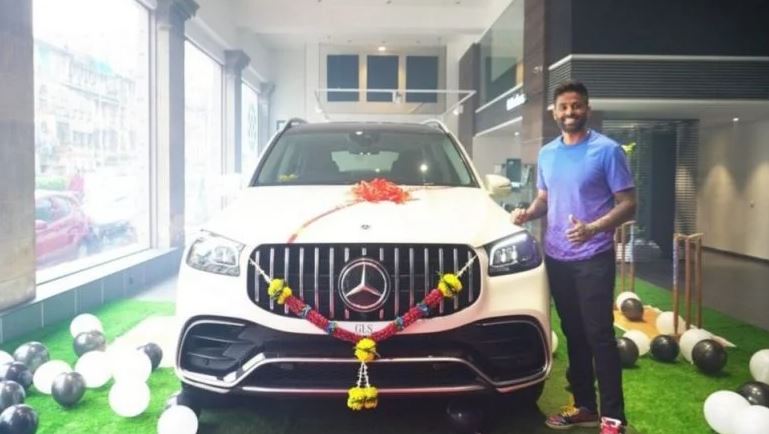 Suryakumar Yadav posing with his Mercedes Benz GLS